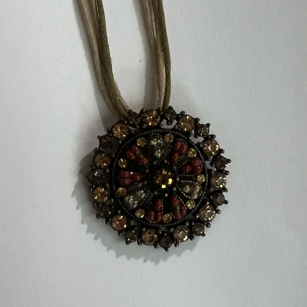 Round Pendant Multi-Color Brilliant Stones Gold Cord Strand